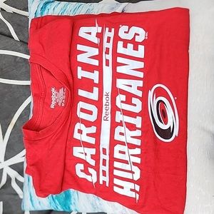 Gently worn Carolina Hurricanes Hockey T shirt unisex